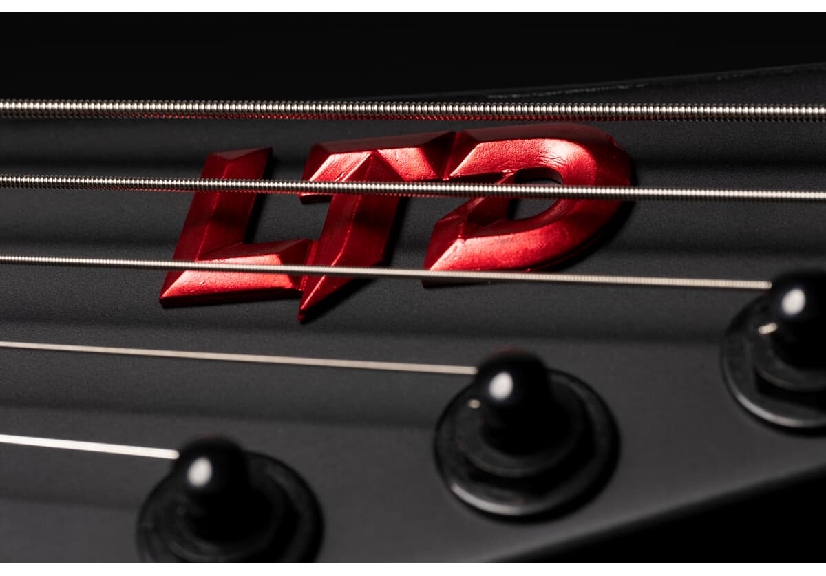 EXL-7B Black Metal II Black Redburst Satin Baritone E-Gitarre
