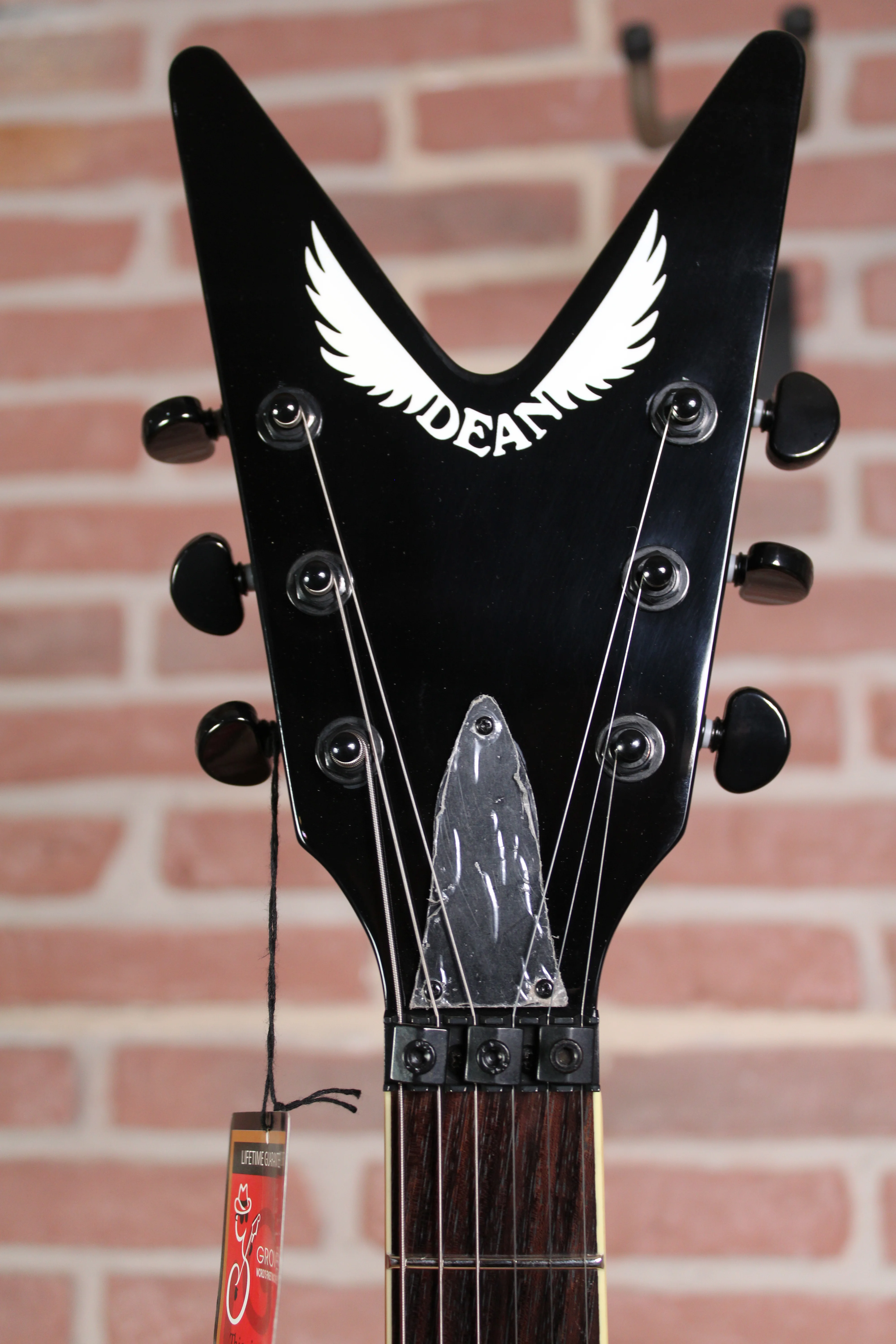 Dean Guitars ML 79 Floyd Flame Top Duncans TBZ - Kopfplatte in frontaler Ansicht