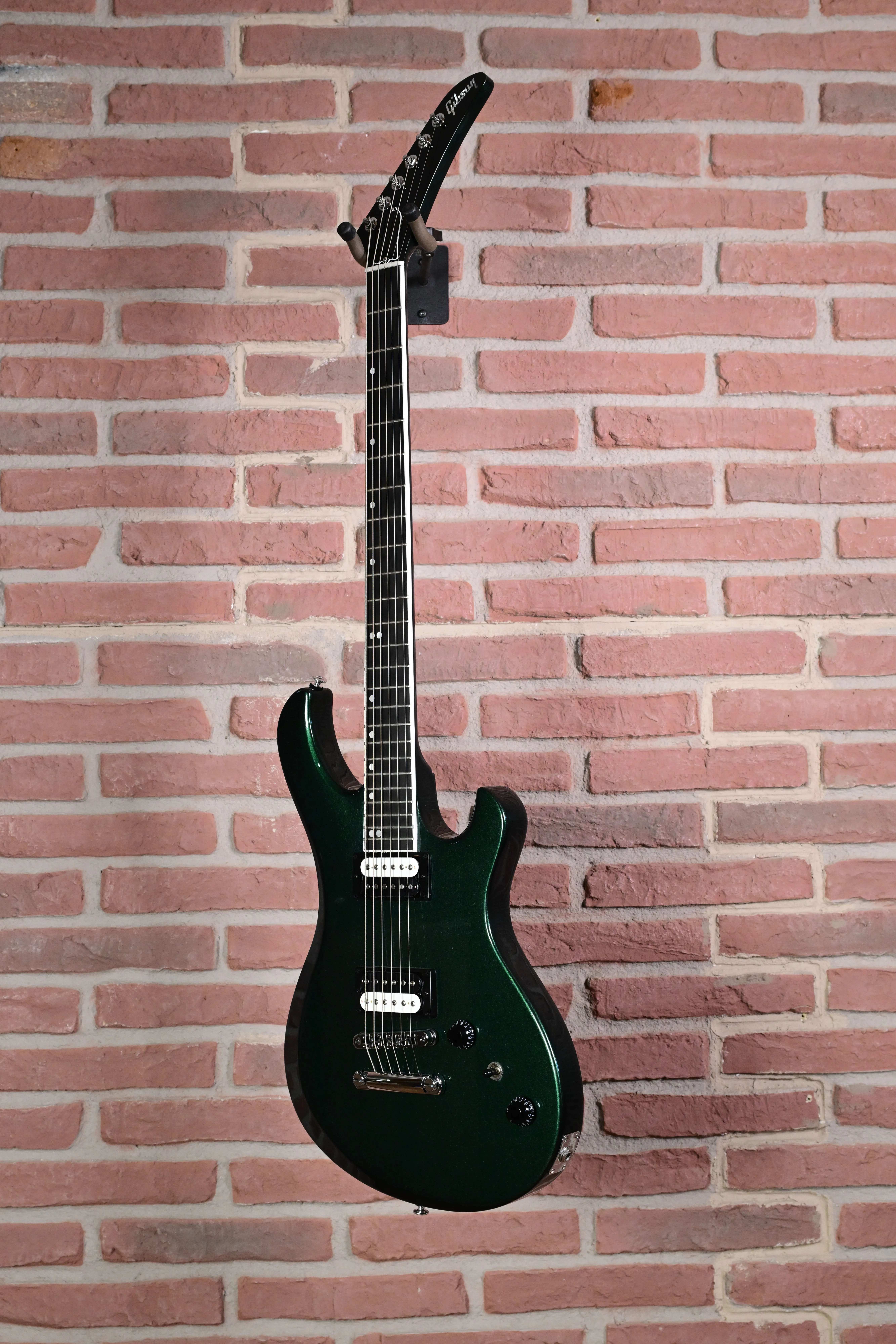 E-Gitarre, dunkelgrün, Massivkorpus, Humbucker, schwarzes Griffbrett