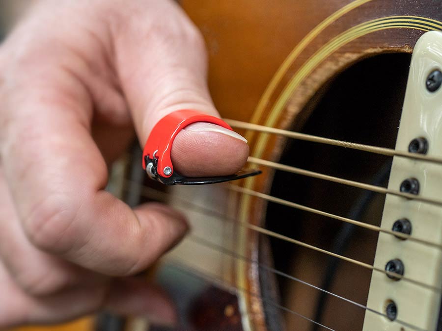 Spring action thumb pick Light Lefty