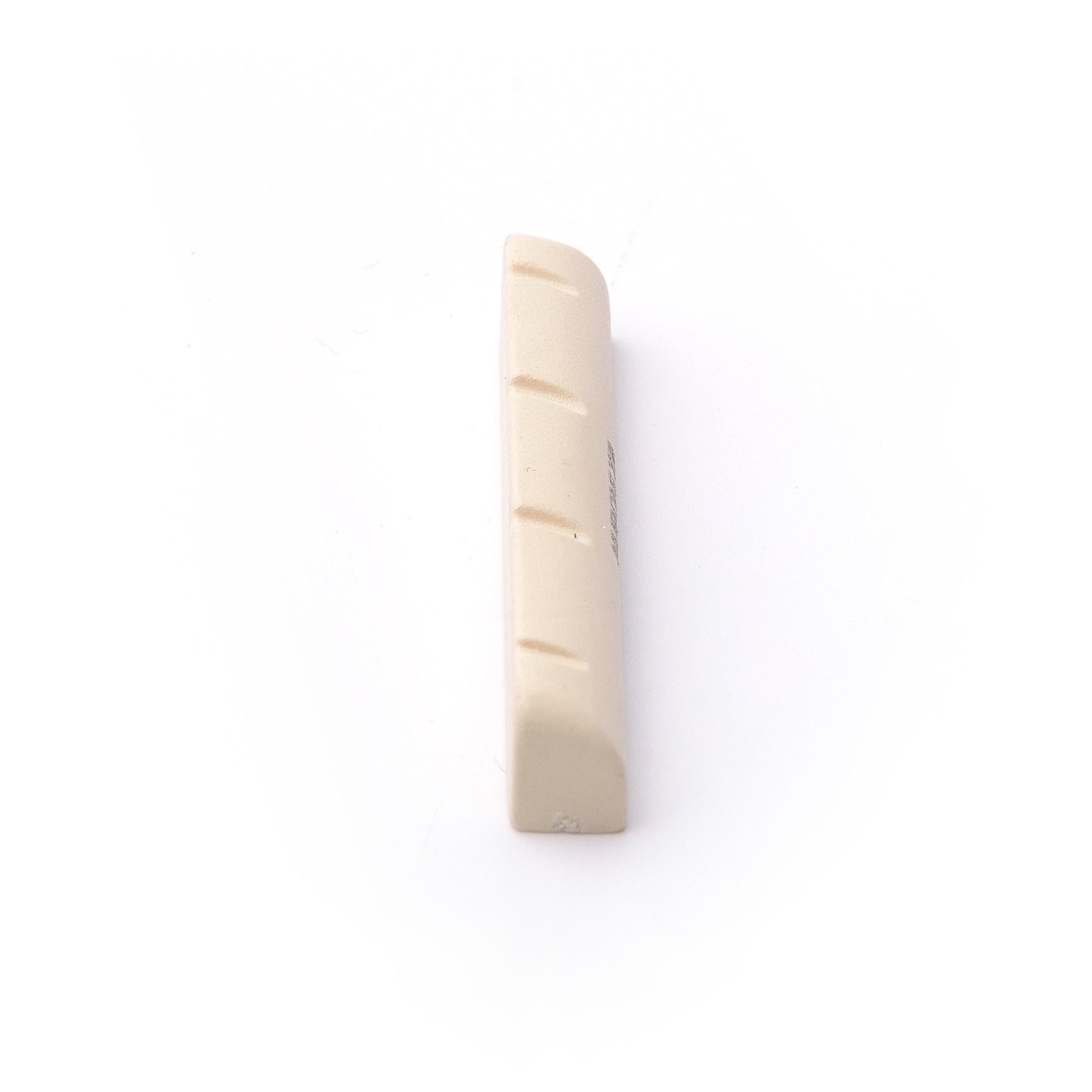 TUSQ PQ-1253-00 - Slotted Ukulele Nut (34.96 x 5.06 mm), 4-String, Flat