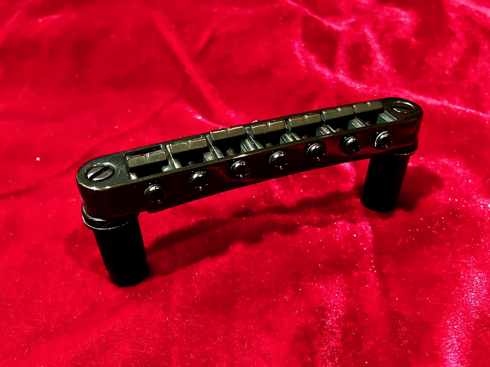 HW27B 7-string Tunamatic Bridge, schwarz